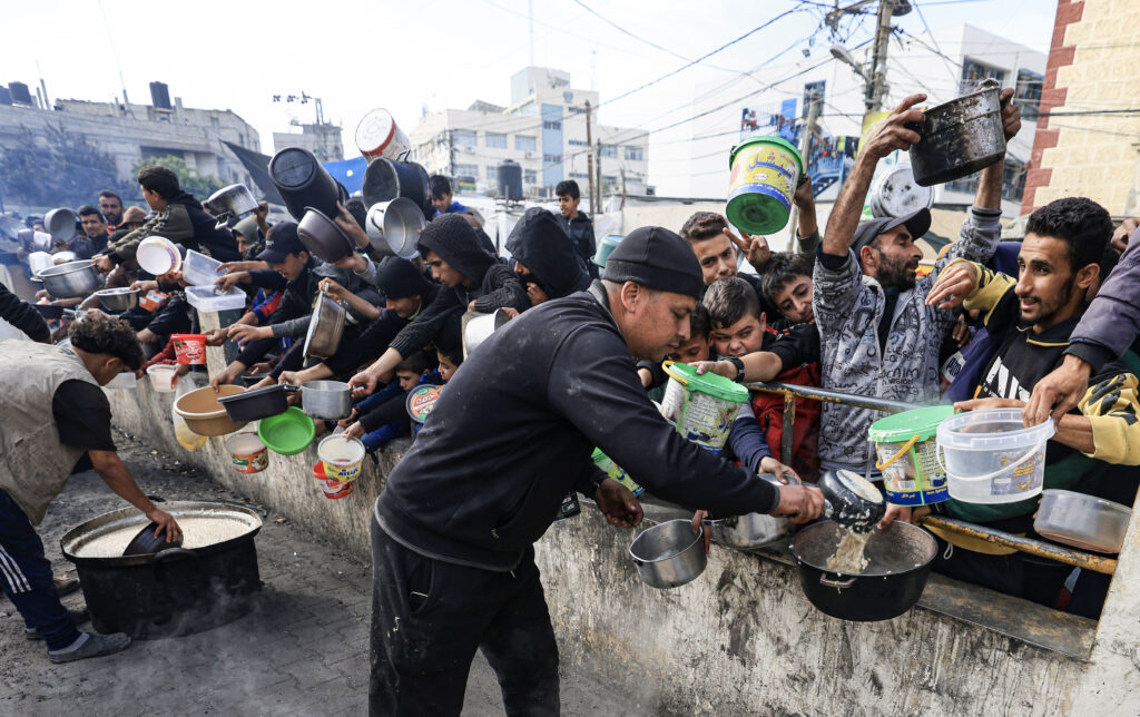Gripped By Hunger, Gazans Hours For Meagre Food