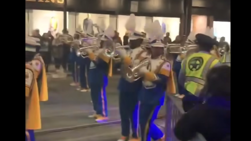 NoLa Band Player Shoved by Police Officer For What?