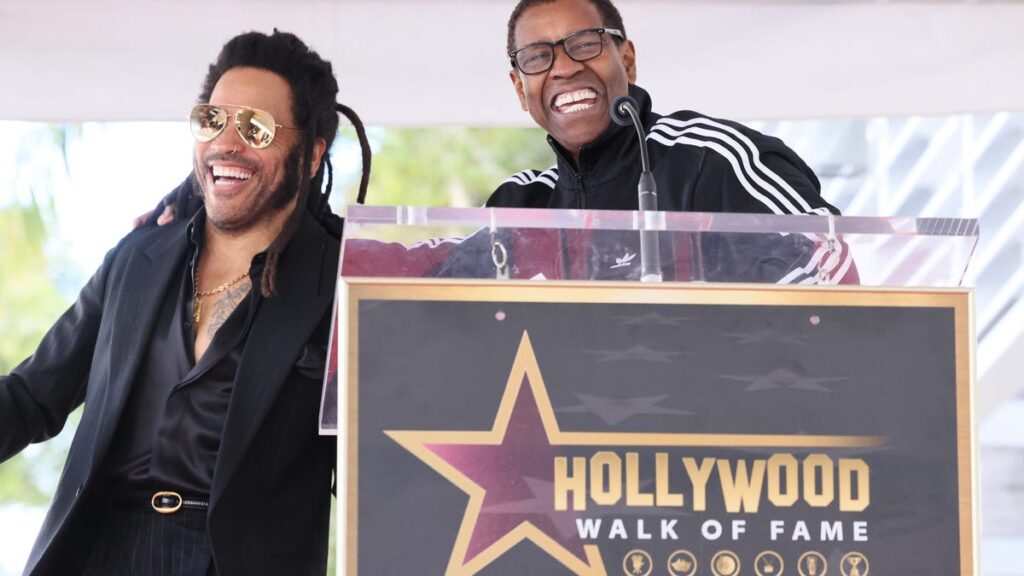 Lenny Kravitz Takes Call From Denzel Washington While On Stage