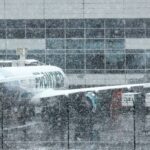 Nearly 500 flights delayed at DIA amid light snow