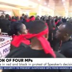 Minority MPs protest suspension of their colleagues in black and red attire