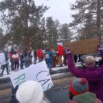 Protesters gather outside Rocky Mountain National Park to support federal workers