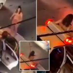 Video shows naked Iranian woman jumping on police car in protest at country's treatment of women