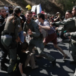 Palestinians flee IDF attacks on Gaza City as Israelis protest against occupation plan
