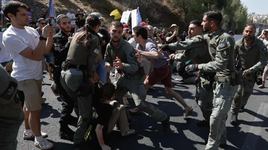 Palestinians flee IDF attacks on Gaza City as Israelis protest against occupation plan
